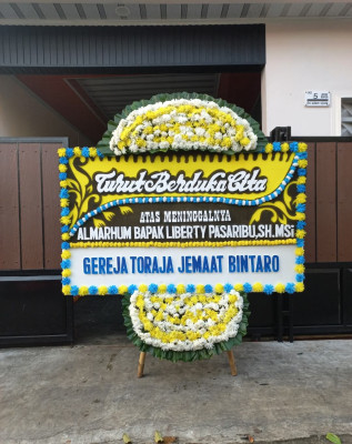 Papan Bunga Duka di Kayu Manis